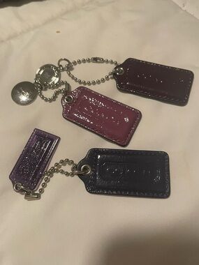 Coach Glossy Leather Key Tags in Plum, Violet and Black